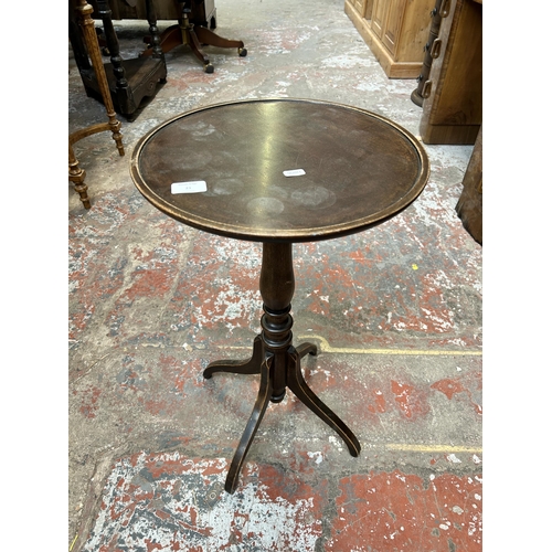 21 - A Georgian style mahogany circular side table - approx. 65cm high x 37cm diameter