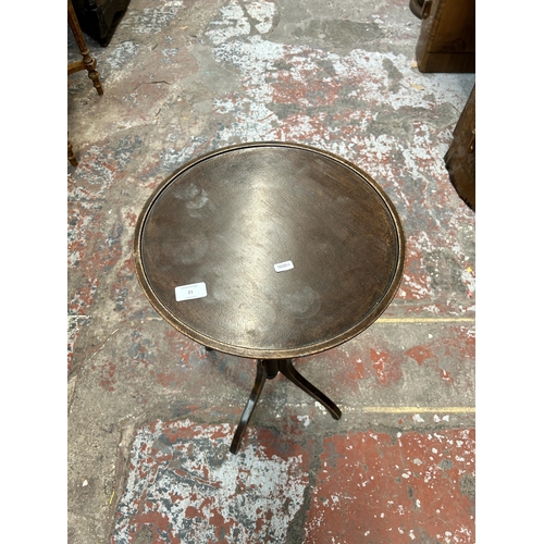 21 - A Georgian style mahogany circular side table - approx. 65cm high x 37cm diameter