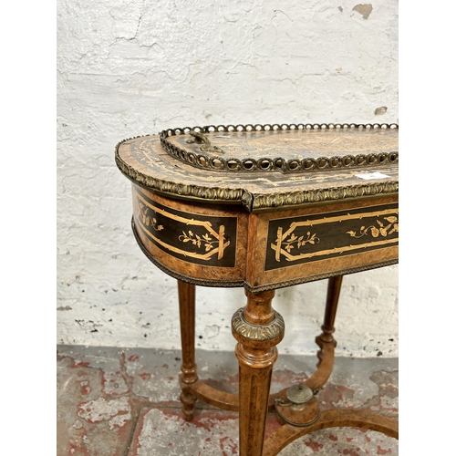 23 - A 19th century French marquetry inlaid amboyna planter side table with gilt metal decoration and flu... 