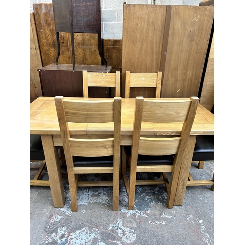 37 - A modern oak extending dining table and six chairs - approx. 78cm high x 80cm wide x 170cm long when... 