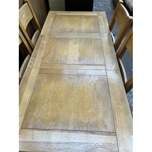 37 - A modern oak extending dining table and six chairs - approx. 78cm high x 80cm wide x 170cm long when... 