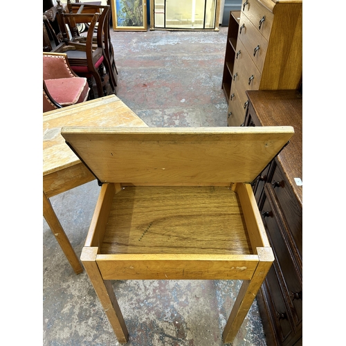 39 - Two 1950s beech school desks - approx. 76cm high x 56cm wide x 46cm deep