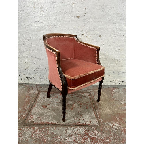 46 - An Edwardian beech and pink fabric upholstered armchair