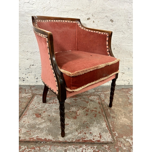 46 - An Edwardian beech and pink fabric upholstered armchair