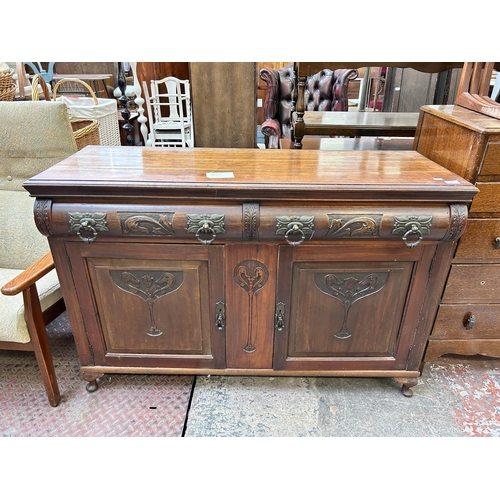 54 - An Edwardian carved mahogany sideboard - approx. 90cm high x 131cm wide x 46cm deep