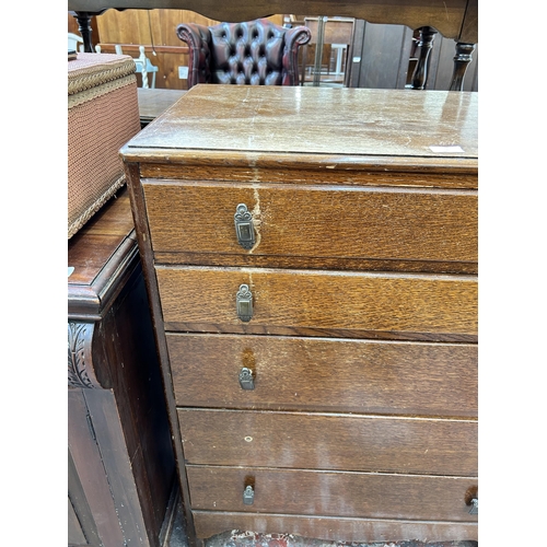 56 - A mid 20th century oak chest of drawers - approx. 101cm high x 77cm wide x 46cm deep