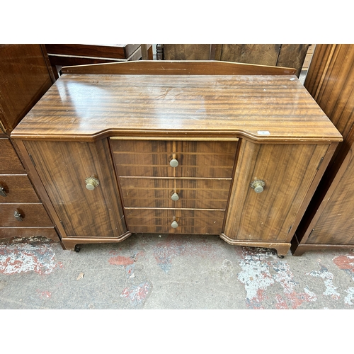 58 - A Denby & Spinks Ltd Leeds & Harrogate walnut dressing table and double wardrobe