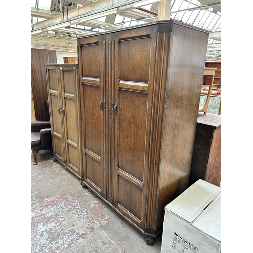 60 - Two mid 20th century oak his and hers double wardrobes, one - approx. 156cm high x 93cm wide x 44cm ... 