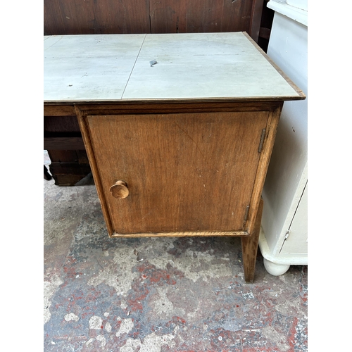 63 - A mid 20th century Meredew oak pedestal desk - approx. 71cm high x 122cm wide x 51cm deep