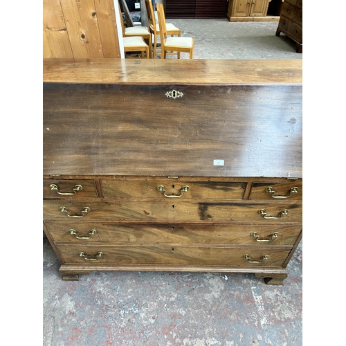 65 - A George III mahogany bureau on bracket supports - approx. 107cm high x 122cm wide x 55cm deep