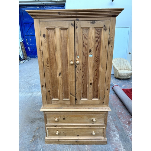 80 - A pine double wardrobe - approx. 188cm high x 103cm wide x 56cm deep