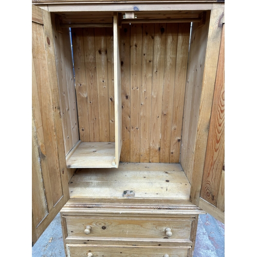 80 - A pine double wardrobe - approx. 188cm high x 103cm wide x 56cm deep