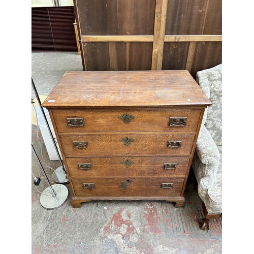 83 - A Georgian oak chest of drawers on bracket supports  - approx.  103cm high x 97cm wide x 55cm deep