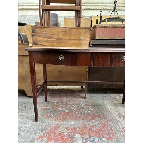 90 - A Regency style mahogany two drawer console table