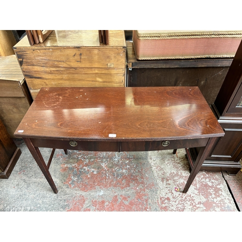 90 - A Regency style mahogany two drawer console table