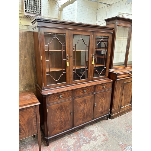 94 - A Regency style mahogany bookcase with three astral glazed doors - approx. 177cm high x 132cm wide 4... 