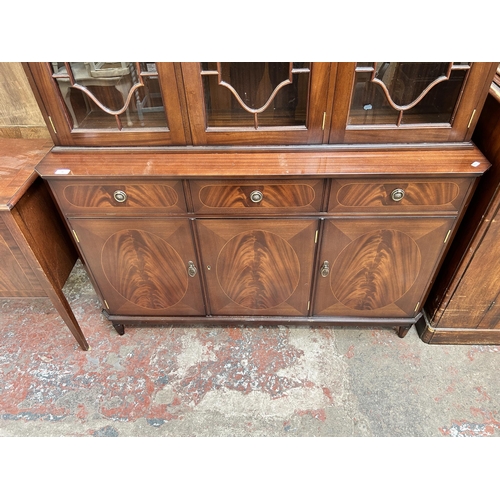 94 - A Regency style mahogany bookcase with three astral glazed doors - approx. 177cm high x 132cm wide 4... 