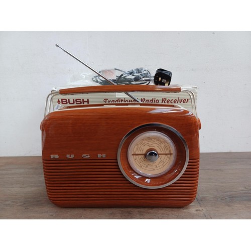 707 - A boxed Bush TR82WOOD portable three band radio