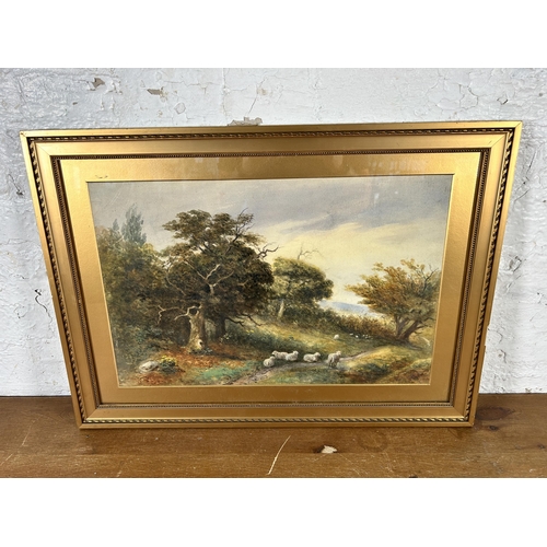 261 - A 19th century gilt framed watercolour of a sheep and landscape scene - approx. 46cm high x 64cm wid... 