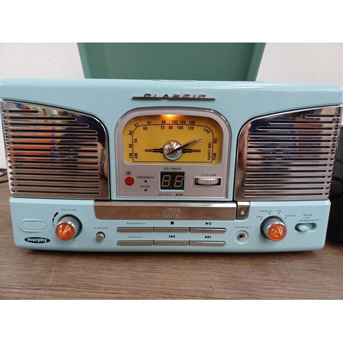 709 - Two items, one Sharp WQ-268E portable stereo four-band radio/twin cassette recorder and one Murphy T... 