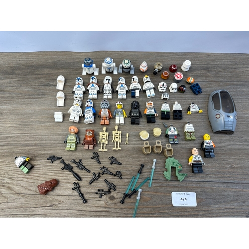 474 - A collection of Lego Star Wars figurines to include R2-D2, Stormtroopers, Darth Vader etc.