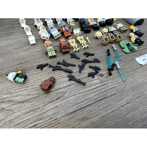 474 - A collection of Lego Star Wars figurines to include R2-D2, Stormtroopers, Darth Vader etc.