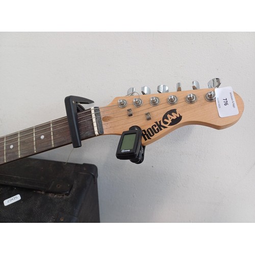 776 - A Rock Jam electric guitar package comprising Stratocaster style electric guitar, GA-20W practice am... 