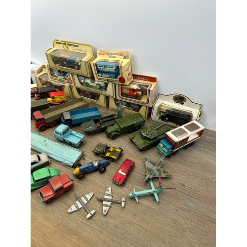 478 - A collection of boxed and unboxed vintage die cast model vehicles to include Dinky Toys Bedford Pull... 