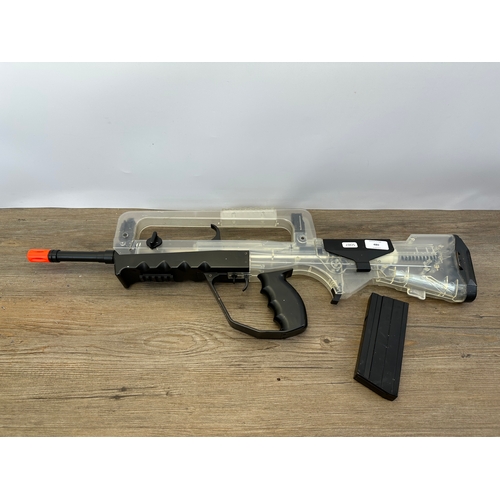 480 - A Cybergun Famas style airsoft gun