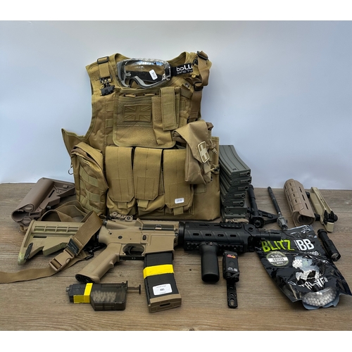 481 - A collection of airsoft equipment to include G&G Armament CM16 AEG, G&G magazines, spare stock and B... 