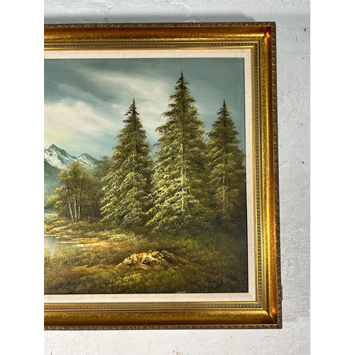 284 - A gilt framed mountain scene oil on canvas, signed Sterns - approx. 76cm high x 107cm wide