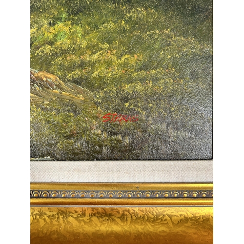 284 - A gilt framed mountain scene oil on canvas, signed Sterns - approx. 76cm high x 107cm wide