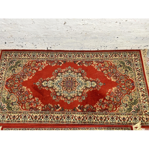 189 - Two Prado Orient Keshan Super 100% wool rugs, one approx. 178cm x 90cm and one approx. 136cm x 69cm