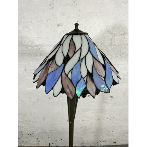 192 - A Tiffany style standard lamp - approx. 148cm high