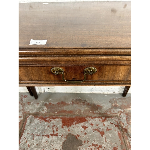 195 - A George III mahogany fold-over tea table - approx. 72cm high x 91cm wide x 89cm long when extended