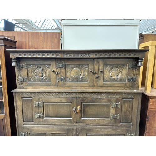 200 - A 17th century style carved oak court cupboard - approx. 152cm high x 147cm wide x 42cm deep