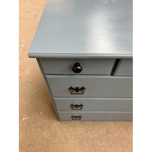 207 - A modern blue painted chest of drawers - approx. 76cm high x 76cm wide x 48cm deep