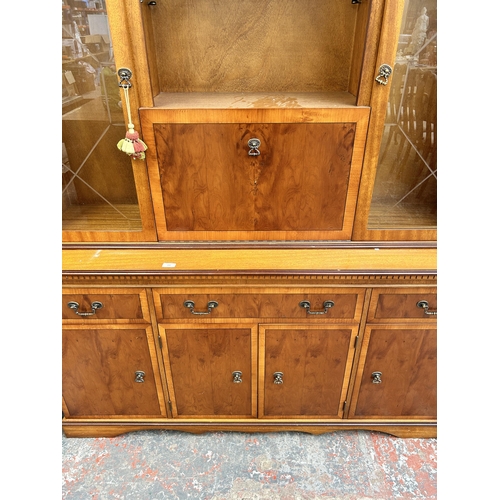 210 - A yew wood display cabinet - approx. 185cm high x 153cm wide x 45cm deep