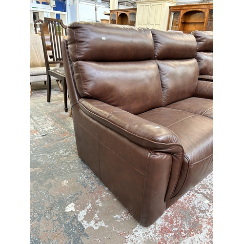 220 - A Violino brown leather two seater sofa - approx. 98cm high x 155cm wide x 84cm deep