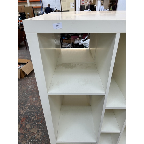 230 - An IKEA Kallax white laminate shelving unit - approx. 150cm high x 89cm wide x 39cm deep