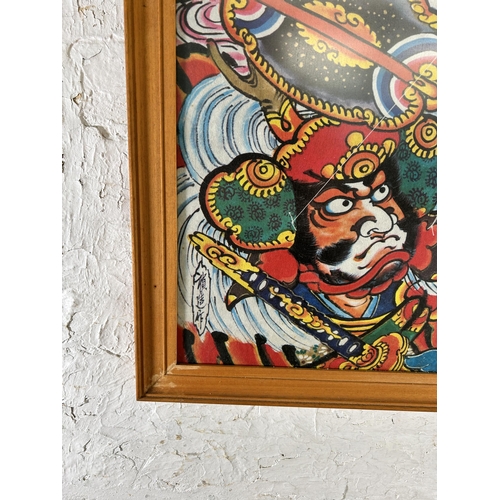 250 - A framed Japanese kite picture - approx. 76cm high x 61cm wide