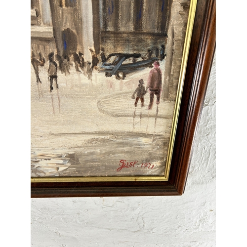 251A - A mid 20th century framed oil on canvas depicting a street scene,  signed lower right and dated 1971... 