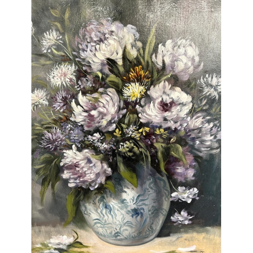 259 - A gilt framed floral still life oil on canvas, signed lower right - approx. 74cm high x 63cm wide