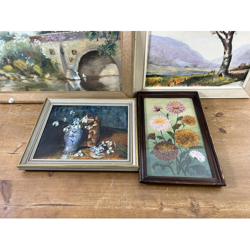 262 - Four framed oil paintings to include floral still life, signed SK and dated 1920, landscape scene, s... 