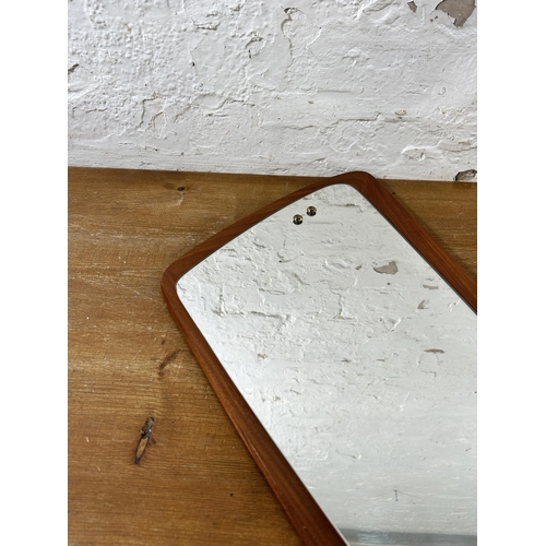 264 - A mid 20th century teak framed asymmetrical wall mirror - approx. 75cm high x 34cm wide