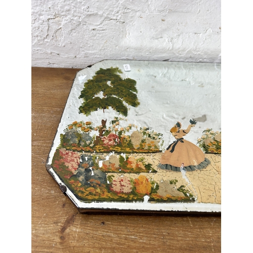 265 - A vintage frameless bevelled edge wall mirror with hand painted crinoline lady scene - approx. 33cm ... 