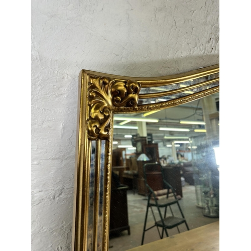 283 - A 19th century style gilt framed wall mirror - approx. 89cm high x 127cm wide