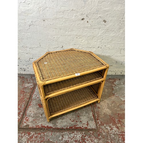 182 - A wicker and cane TV stand