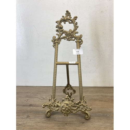 418 - A Rococo style gilt metal easel - approx. 40cm high