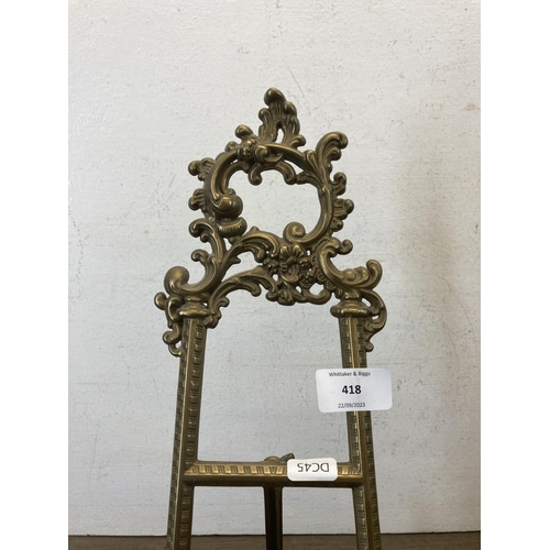 418 - A Rococo style gilt metal easel - approx. 40cm high